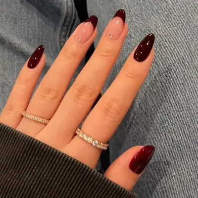 a deep burgundy manicure