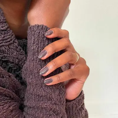 A chocolate brown manicure