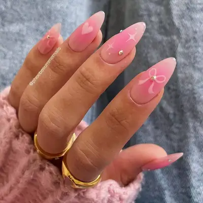 Pink aura nails with pretty airbrushed designs