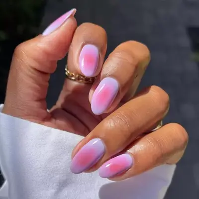 Bubblegum pink nails with airbrush nail art hearts and stars