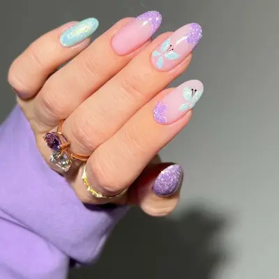 shimmery nails with butterfly designs