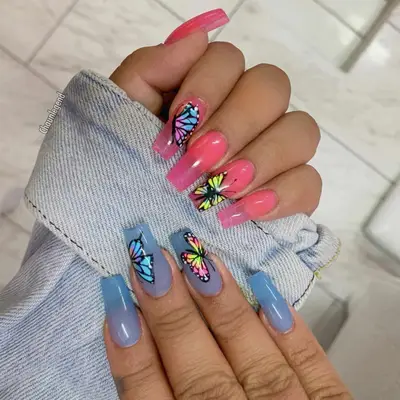 Pink and blue nails with butterflies