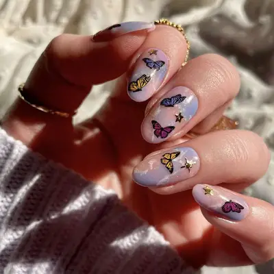 pink and purple marble nails with butterflies