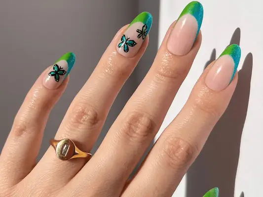 green and blue butterfly nails