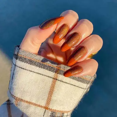Bronze and orange French manicure