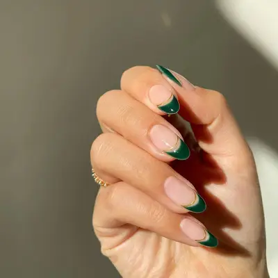 green and gold negative space french manicure