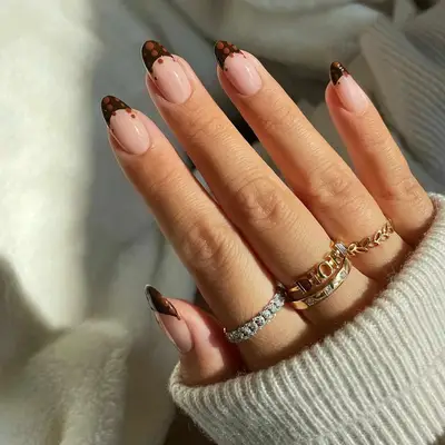 Brown dotted French manicure