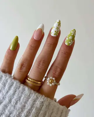 Almond nails with green and white daisy design
