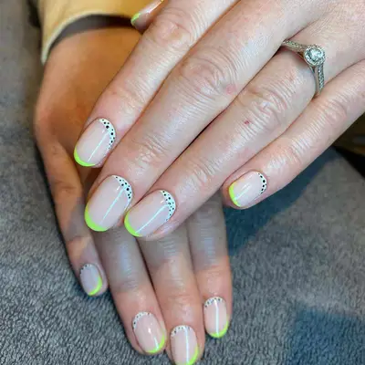 neon polka dot manicure