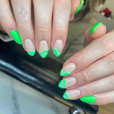 blue and neon green swirl nails