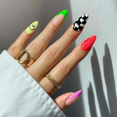 neon french accent nail in a patterned nail set