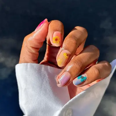 Multi-colored flower pressed nails