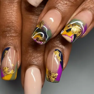 Colorful marble nails with gold foil detail