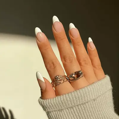 Traditional white French manicure on long nails