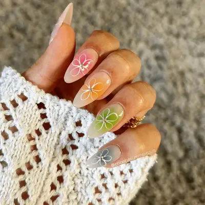 Multi-color flower nail art with airbrushed effect
