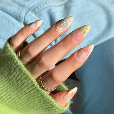 Butter yellow French manicure with pastel floral nail art