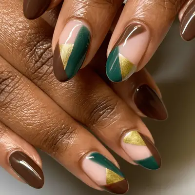 brown, gold, and emerald manicure