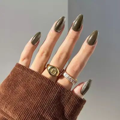 model with gunmetal velvet nails
