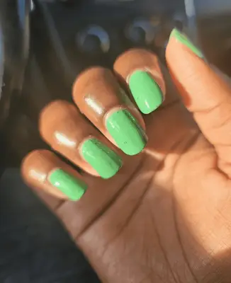 black metallic pearl nails closeup