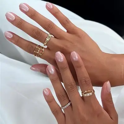 Pale pink iridescent glazed donut dip powder manicure