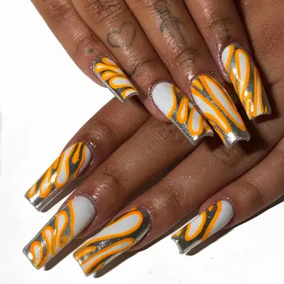 Abstract Blob Chrome Nails in shades of orange, silver, and white