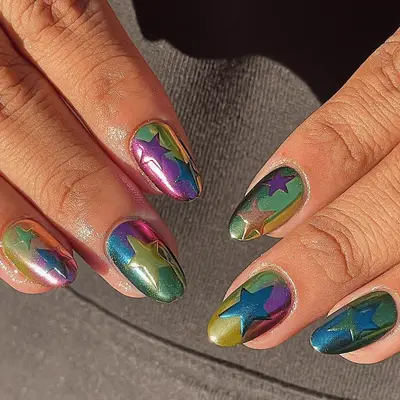 Chrome ombre nails with stars detail