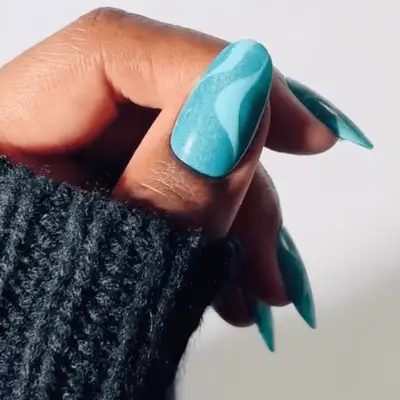 Teal chrome swirl nails