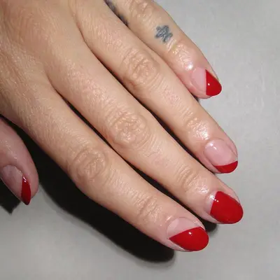 Negative space red nails in various designs