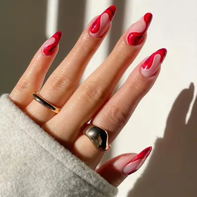 Red gradient wave design manicure with gold rings