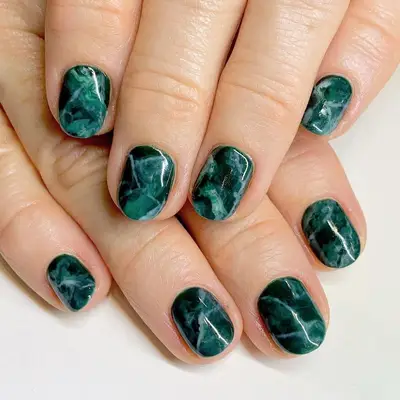 Dark jade nail design