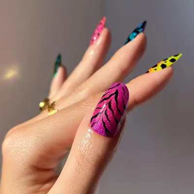 a zebra print holographic thumb nail