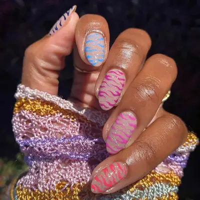 a glittery zebra manicure