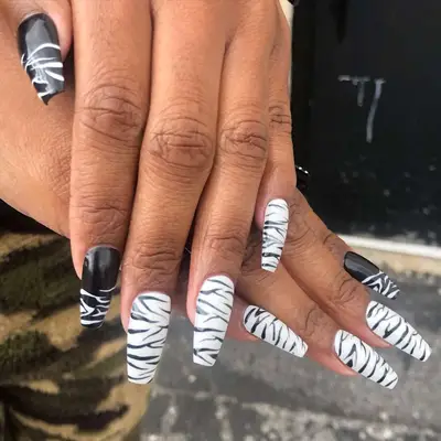 black and white zebra nail design 