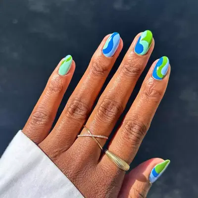 Seaweed green and blue nails with waves