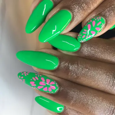 Green nails with pink floral spots