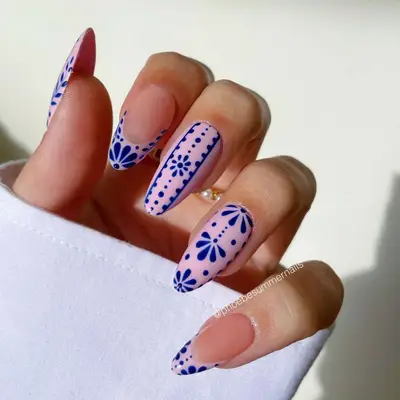 Pink and blue french toile manicure.