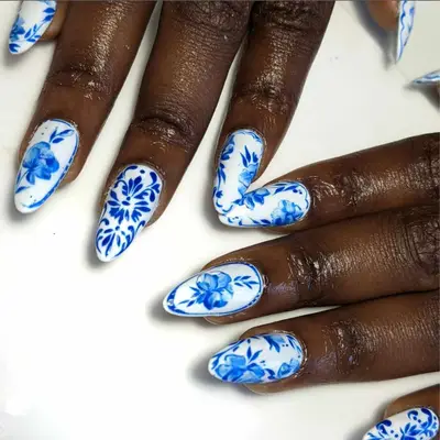 French Toile blue and white manicure.
