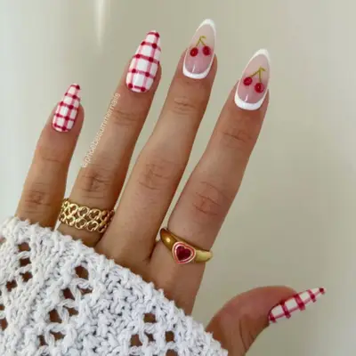 Cherry and plaid nails.