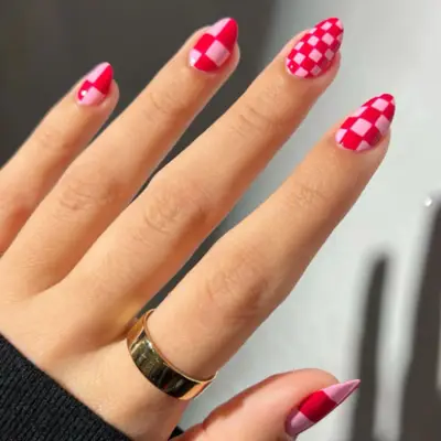 Pink and red checkered manicure.