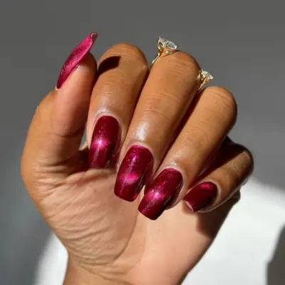 Red magnetic manicure.