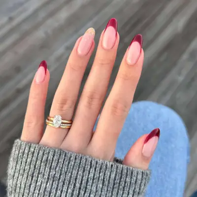 Dark red french tips.
