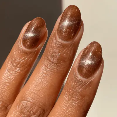 Brown glitter nail polish