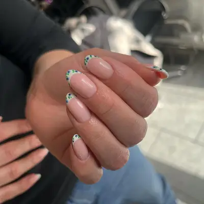 French manicure with blueberry pattern on tips