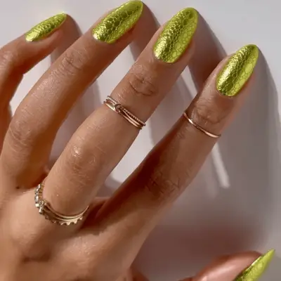 a green snakeskin manicure