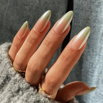 a green chrome ombre manicure