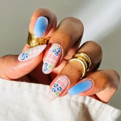 blueberry grid nails with blue aura accents