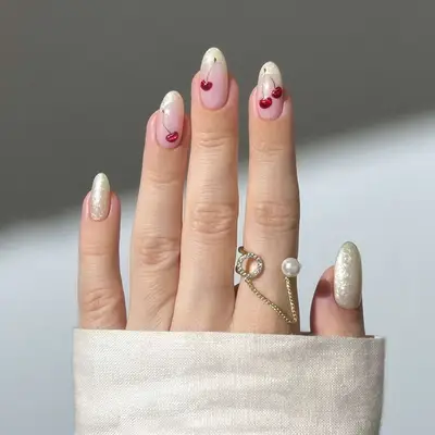 Hand with decorated fingernails and a ring accessory