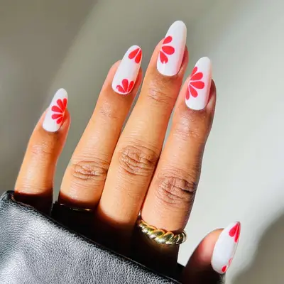 St. John’s Floral Nails - MYM Beauty Basketball Nail Ideas for March Madness 