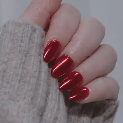 Red chrome oval nails.