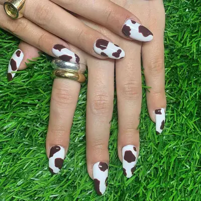Brown cow print manicure